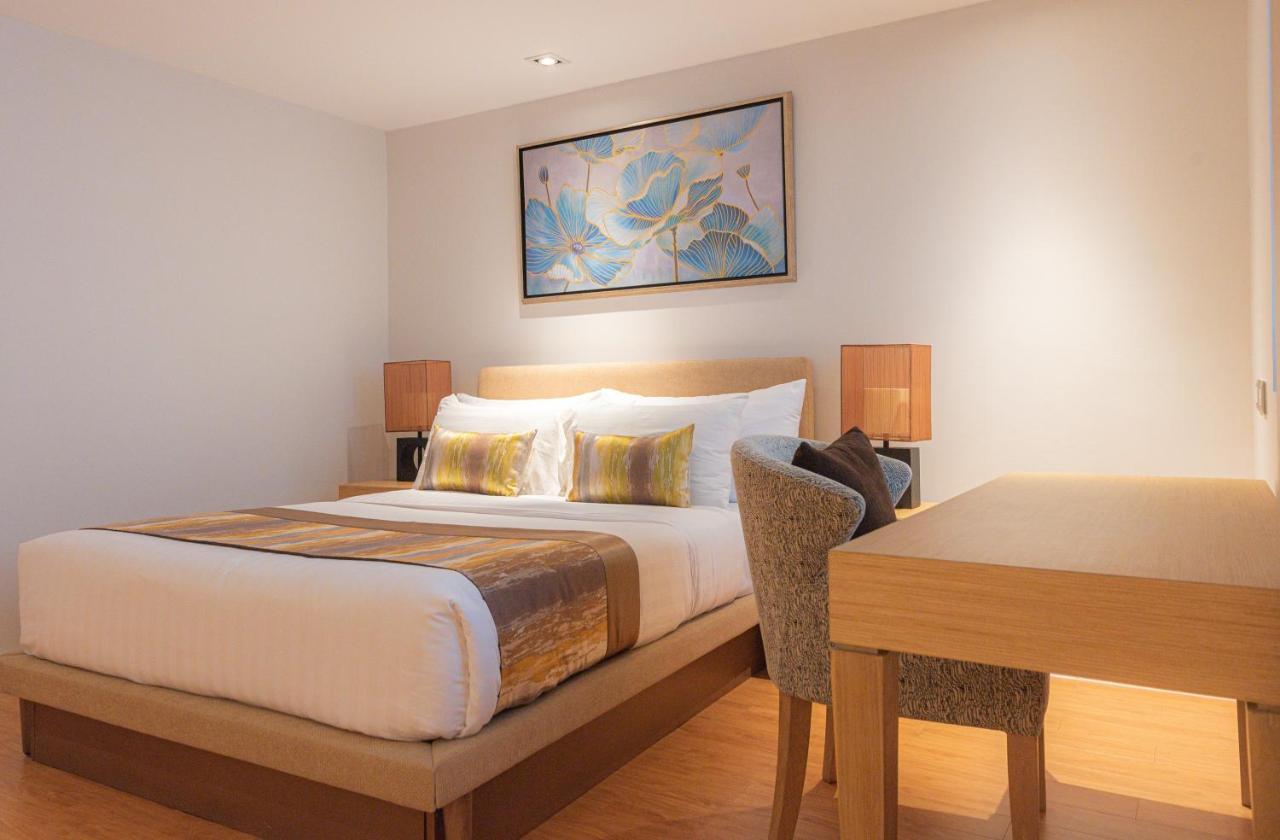 Summit Windmill Golf Suite Hotel At Suvarnabhumi Μπανγκόκ Εξωτερικό φωτογραφία A bedroom at the hotel